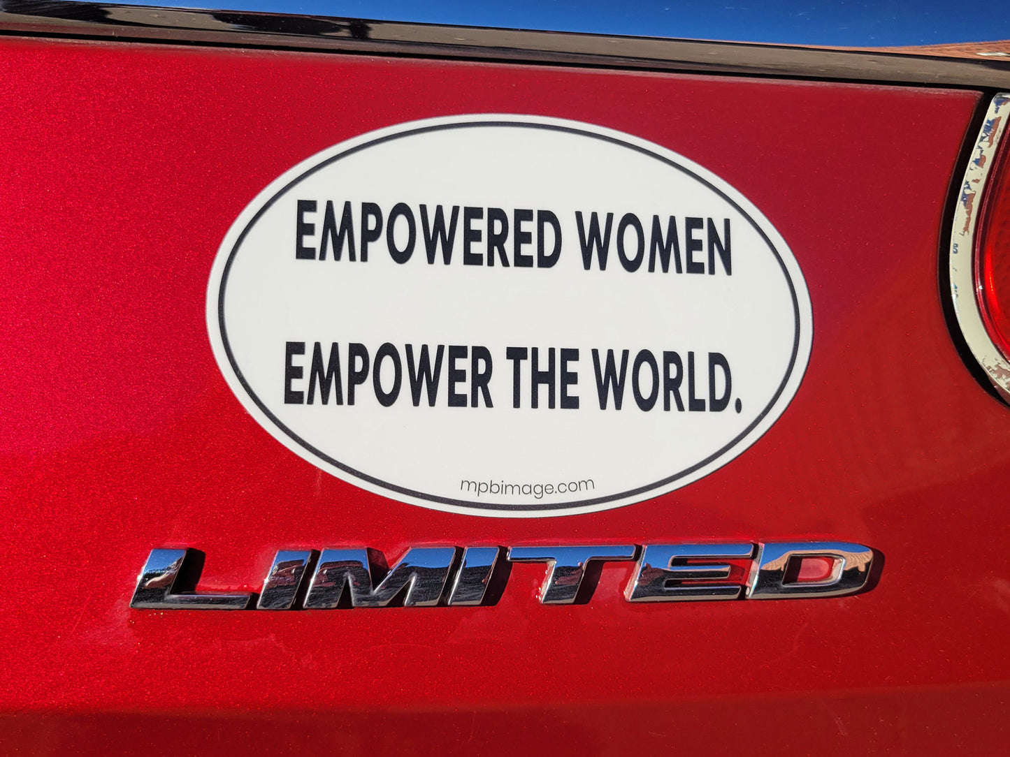 "Empowered Women Empower the World"  Oval Car Magnet
