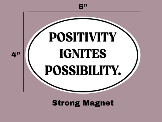 "POSITIVITY IGNITES POSSIBILITY." Oval Magnet